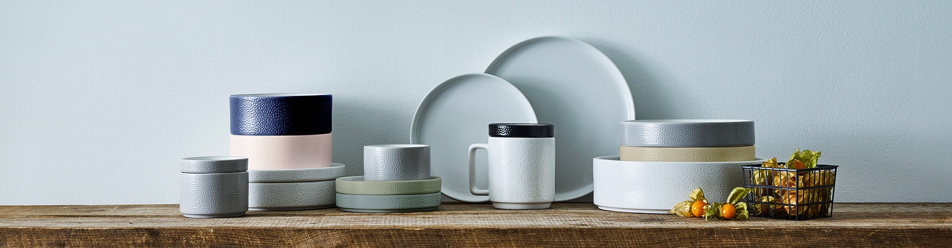 Tableware arranged across a shared table